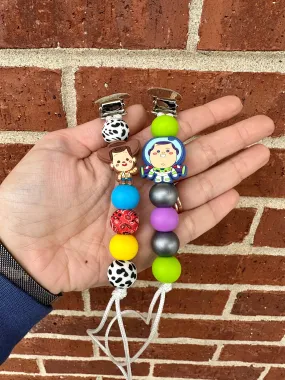 Cowboy or Spaceboy Pacifier Clip